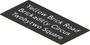 Sticker  1.2 x  2.6 with White "Yellow Brick Road", "Brickadilly Circus" and "Twobytwo Square" on Black Background